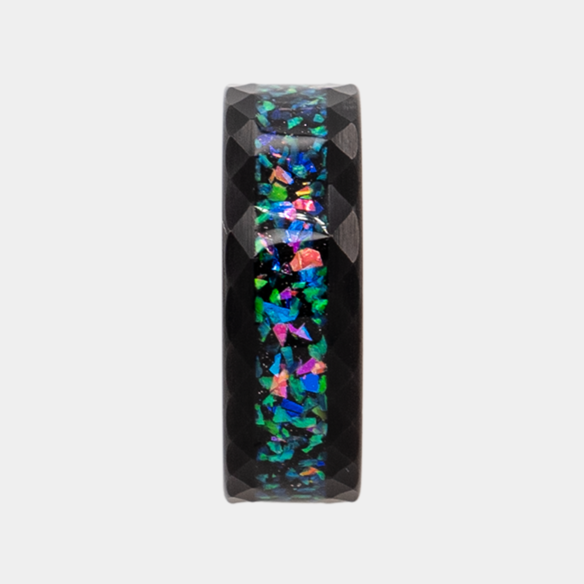 Aeolus ring – Hammered Black Tungsten, Crushed Opal Inlay from the Hustler Collection. Ring standing upright to show profile and thickness.